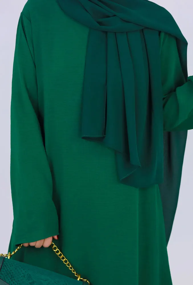 Dark Green Kira loose slip dress with pockets in maxi length and with long sleeve